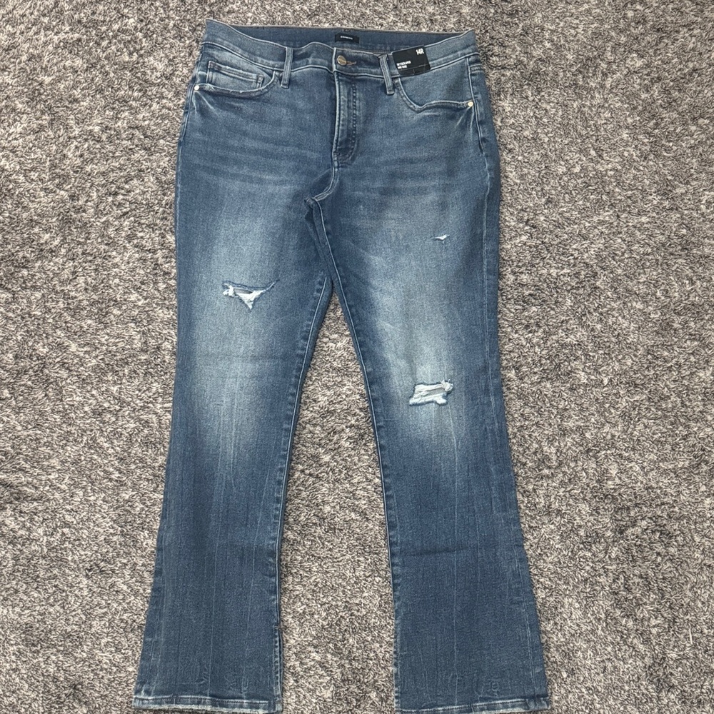 Mid-Wash Distressed Women’s Jeans
